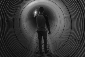 14 Oranges Man in Tunnel