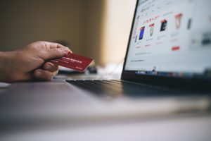 14 Oranges User with Credit Card doing Online Shopping