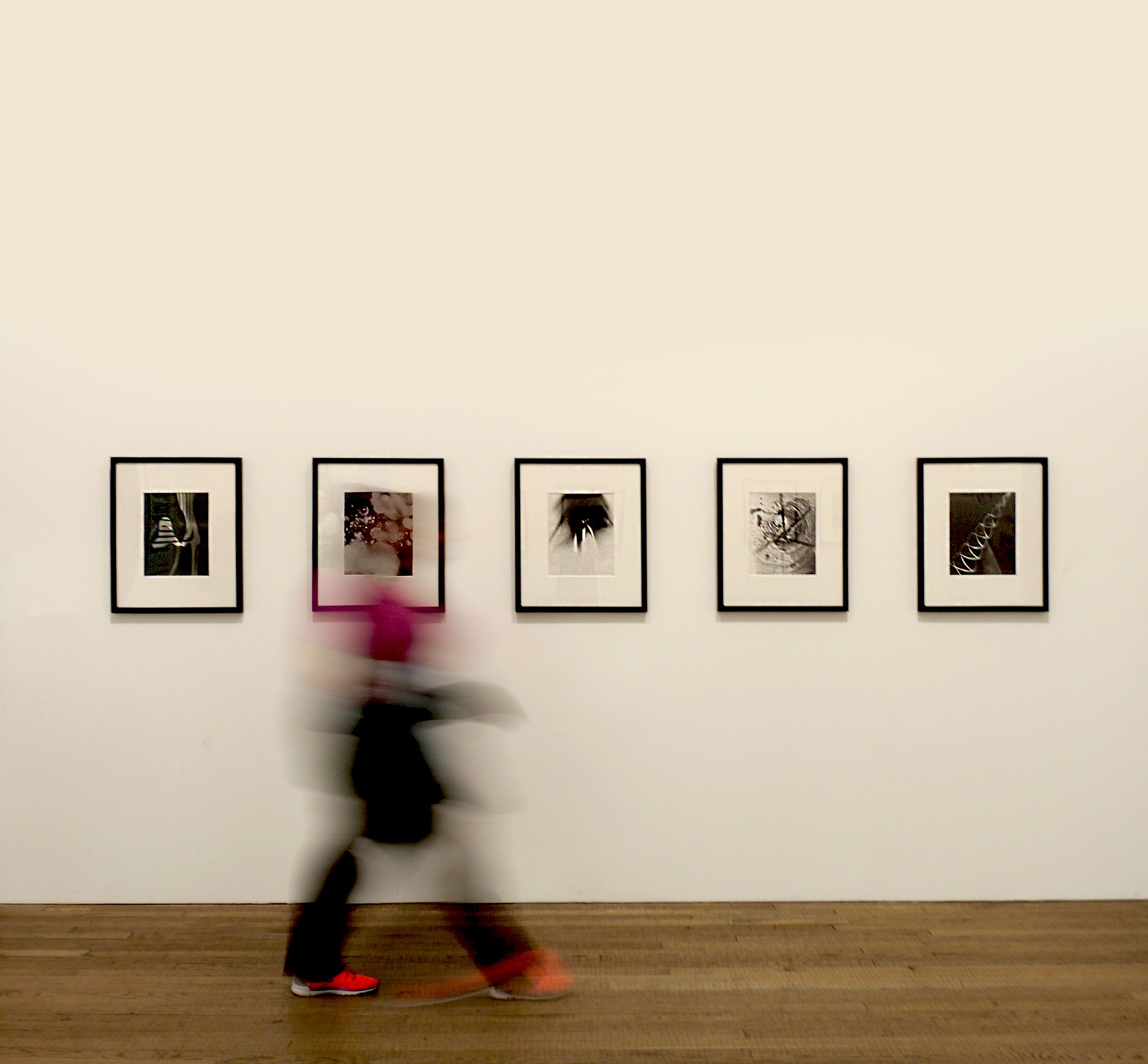 14 Oranges Blurry Person walking in art museum