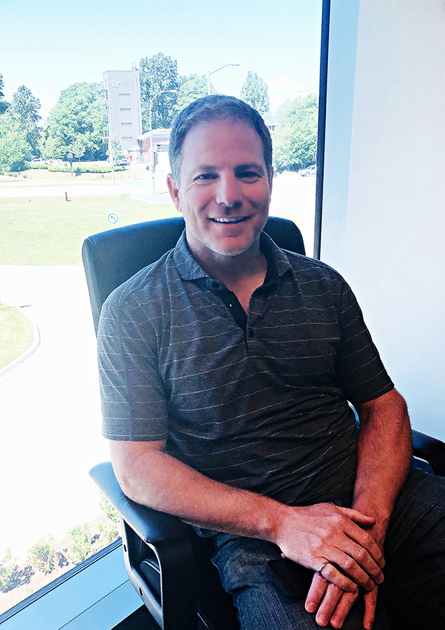 14 Oranges Daniel Lefrancois Chief Technology Officer Sitting in office chair