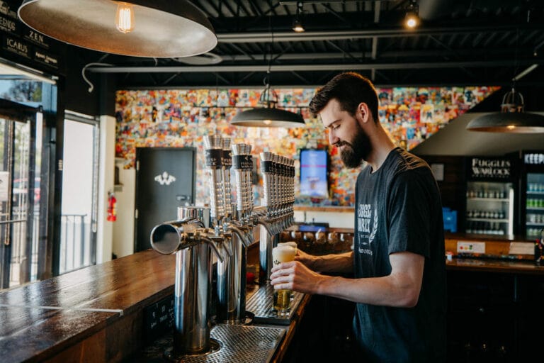 14 Oranges Fuggles & Warlock Restaurant Bartender Serving Beer