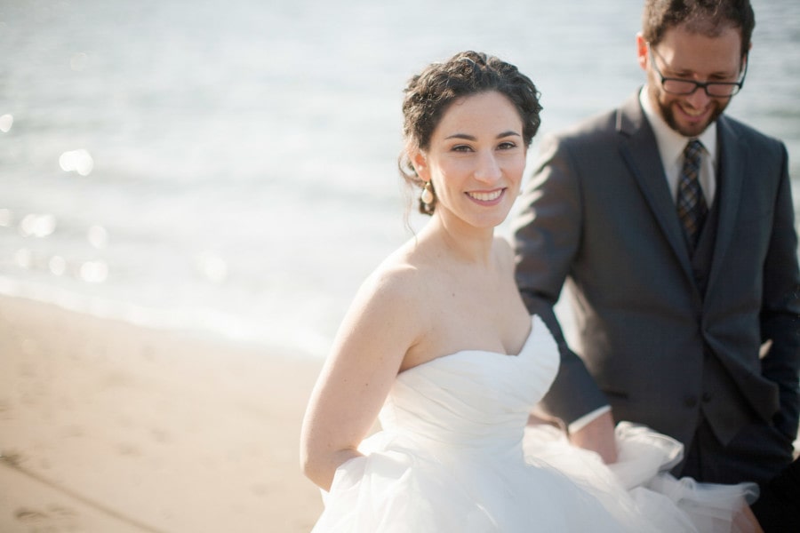 14 Oranges Ciuffa Photography Website Bride looking at camera with Groom